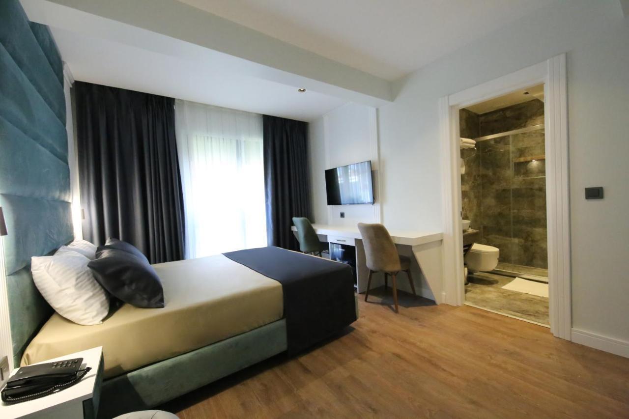 Axu Airport Hotel Arnavutkoy Exterior foto A room at the hotel