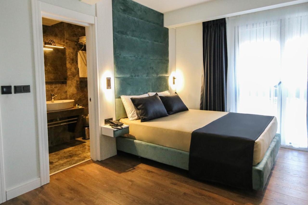 Axu Airport Hotel Arnavutkoy Exterior foto A bedroom in a hotel