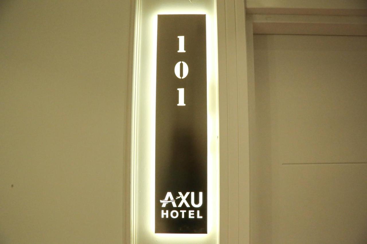 Axu Airport Hotel Arnavutkoy Exterior foto A room sign at Axu Hotel